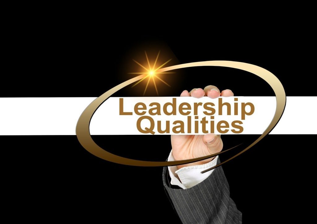 A modern illustration of a leader standing confidently as waves of digital icons and diverse people flow around them, symbolizing adaptability and relevance in leadership.
